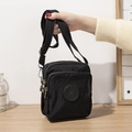 Black nylon crossbody phone bag for women with multi-zipper layers and adjustable strap - Black
