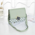Crossbody phone bag in mint green and beige floral patchwork with metallic buckle - Green