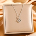 Detail of silver clover pendant with white mother-of-pearl in a champagne gift box - Silver White Mother of Pearl