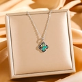 Silver titanium four-leaf flower necklace with iridescent shell inlay on gold satin - Silver Abalone Shell