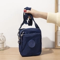 Compact navy blue nylon crossbody bag with multi-zipper compartments and adjustable strap - Dark Blue
