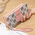Portefeuille femme long à double fermeture éclair rose avec motif monogramme marron - Rose