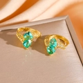 Macro detail of gold-tone emerald huggie earrings with pear-cut green stones and small diamonds - Gold Stud Earrings (8877)
