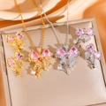 Elegant jewelry set with pink crystal bow necklaces and tassel star earrings in gold and silver - Butterfly Jewelry Set / Gold
