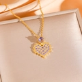 Golden heart necklace with purple crystal pendant on an elegant silk background - Purple Heart Necklace (8881) / Gold