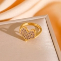 Macro shot of heart-shaped gold ring with purple micro-pave stones on brushed metal - Purple Heart Ring (8881) / Gold