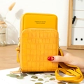 Vertical yellow crossbody phone bag with crocodile pattern and adjustable shoulder strap - Yellow
