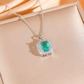 Elegant emerald-cut green gemstone necklace set with white zircon halo on champagne silk - Silver Necklace (8886)