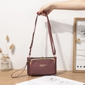 Bolso bandolera de cuero lichi rosa empolvado con cierre dorado y correa ajustable - Rosa oscuro