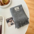 Deep grey 100% wool scarf featuring classic tassels and warm minimalist winter style - Medium Grey