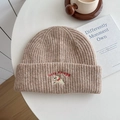 Knitted beanie hat in light coffee with cute embroidered puppy and lucky text - Hat—Khaki