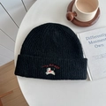 Solid black knitted beanie with embroidered white puppy logo and Lucky text - Hat—Black