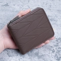 Deep brown leather short wallet for men with geometric quilted texture and zip closure - Brown