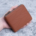 Brown leather wallet with L-shaped metal zipper and geometric stitching detail - Brown
