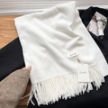 Solid white baby velvet scarf with tassels on black coat with fashion accessories - Creamy White