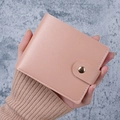 Pink bifold minimalist wallet with lychee texture and round gold metal clasp - Pink