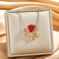Elegante collana con rosa dorata, simbolo dell'infinito e cristalli su raso - Simbolo dell'Infinito Rosa Rossa