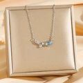Elegante collana con ciondolo a tulipano in acciaio al titanio con zircone blu - Tulipano Argentato (8663)