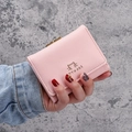 Pink PU leather short wallet for women with golden cat silhouette and flip-top closure - Pink