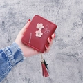 Short dark red PU leather wallet for women with cute flower patch and tassel charm - Burgundy