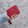 Mini short zip wallet in red leather with stylish star tassel and printed lettering - Burgundy