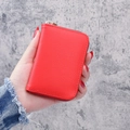 Red lychee pattern leather card holder with gold zipper detail, compact pocket size - Red