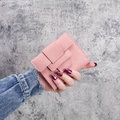 Pink trifold compact leather wallet for women with elegant woven strap buckle detail - Pink