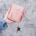 Pink short PU leather floral zipper wallet with star and tassel charm detail - Pink