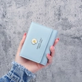 Light blue tri-fold women's wallet with daisy pattern in textured litchi PU leather - Blue