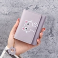 Short tri-fold purple leather wallet with cartoon cat pattern and matching paw pendant - Purple