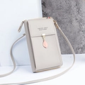 Light grey crossbody phone bag in textured faux leather with leaf charm and strap - Light Gray