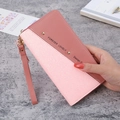 Women's long zip wallet with pink patchwork design and glitter detail with wrist strap - Deep Pink