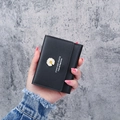 Short black women's daisy tri-fold wallet featuring Forever Youth text and PU leather - Black