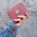 Short zip-around wallet in dusky rose with cat paw print and tassel pendant - Deep Pink