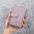 Slim lavender textured leather wallet with snap button closure and side zipper pocket - Purple