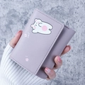Short purple tri-fold wallet for women featuring cute polar bear and star print - Purple