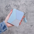 Minimalist short wallet for women featuring blue and grey patchwork with tassel zipper - Blue