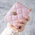 Pink quilted faux leather wristlet wallet with a gold camellia flower logo detail - Pink