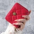 Red quilted leather wristlet wallet with gold camellia accent and diamond stitching - Red
