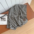 Soft wool-like plaid scarf featuring classic black and white houndstooth with fringe edge - Houndstooth Black Beige