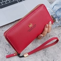 Portefeuille long pour femme rouge rose foncé avec fermeture éclair et logo fleur dorée - Rouge