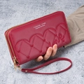 Deep red long wallet for women featuring quilted heart patterns and double zippers with wristlet - Burgundy