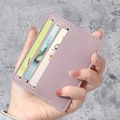 Slim light purple faux leather card holder with vertical slots and white stitching detail - Purple