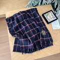 Dark blue plaid scarf with red accents and soft fringes in a cozy winter gift setting - Double Line Large Plaid Navy Blue