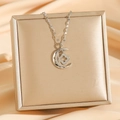 Silver crescent moon necklace with four-leaf clover pendant and sparkling zircon stones - Silver Moon Four-leaf Clover (8424)