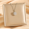 Rotating sunflower necklace with shimmering zircons on elegant champagne silk display - Rotatable Silver (8303)