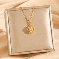 Collana con ciondolo a quadrifoglio rotante in acciaio titanio placcato oro 18k - Quadrifoglio Rotante Oro