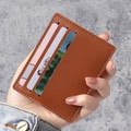 Brown leather slim card holder with three slots and reinforced stitching finish - Brown