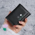 Compact black tri-fold leather wallet with tulip print and floral acrylic pendant - Black