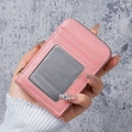 Pink lychee texture card holder with ID window and gold zipper closure for women - Pink
